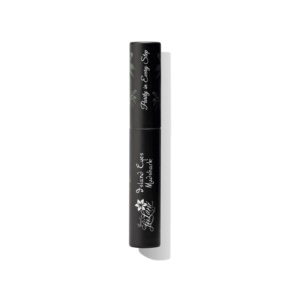 A tube of Island Eyes Mudshark Mascara with black packaging, featuring white and green floral designs.