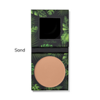 Compact powder with sand color swatch on a leaf-patterned case