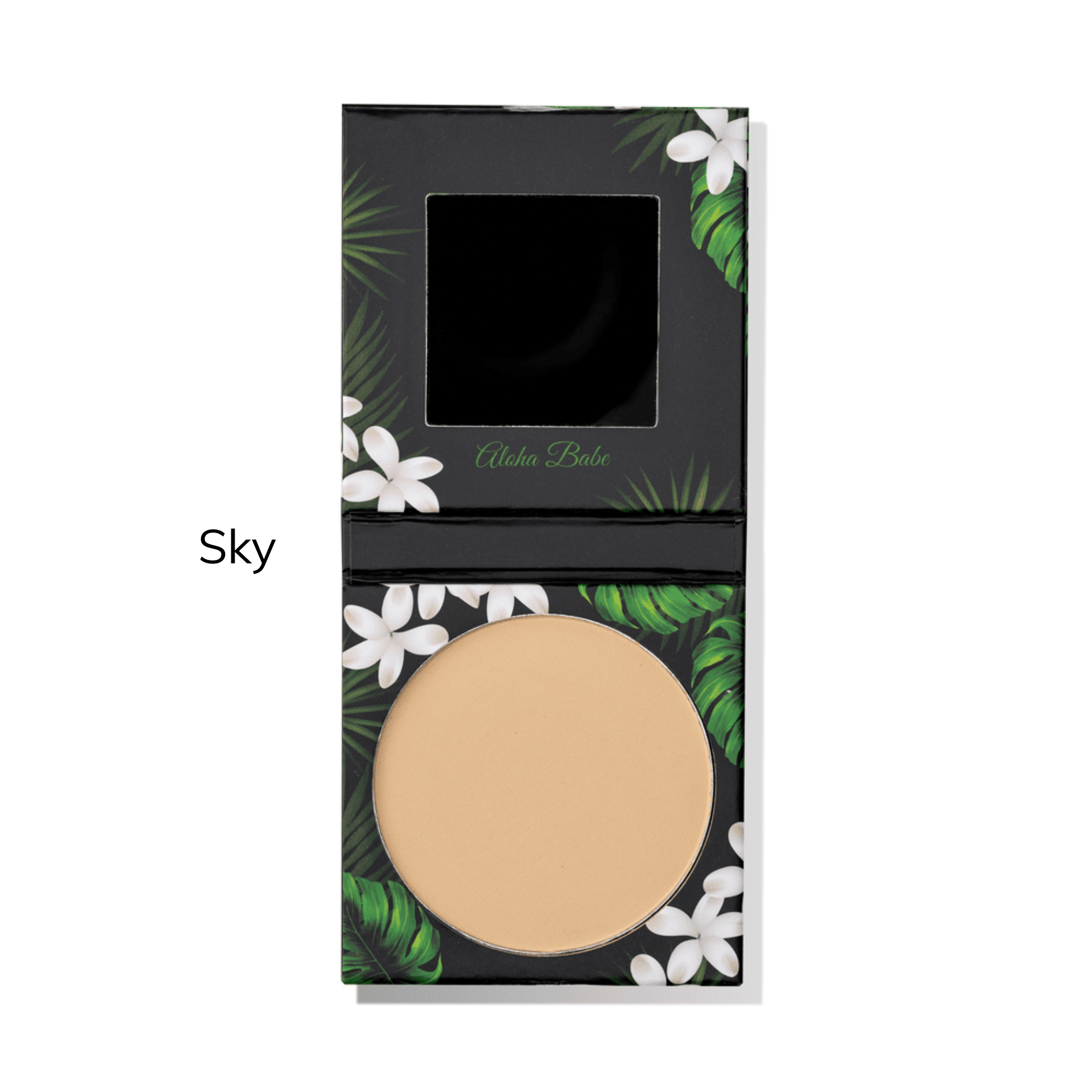 Compact powder with floral and leaf design on packaging